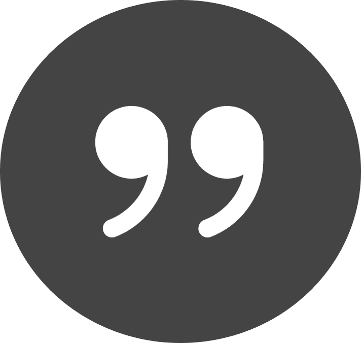 Black and white icon of a quotation mark in a circle, representing a quote